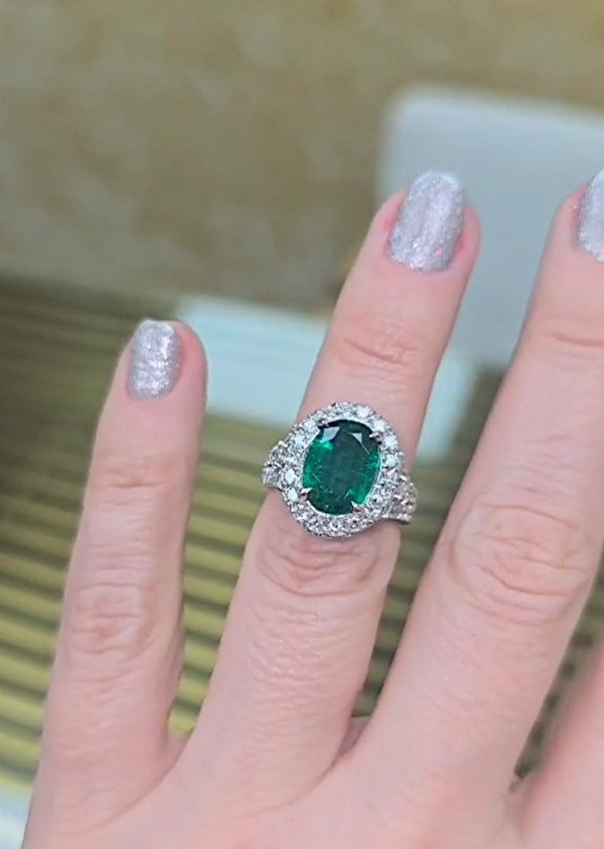 Oval Halo Emerald Ring