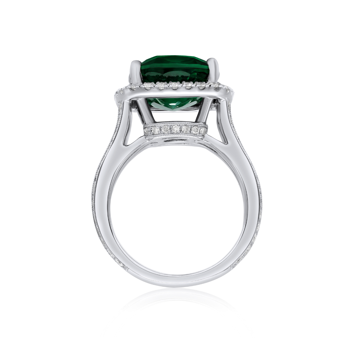 Split shank emerald diamond halo ring in 18kt white gold, size 6.5
