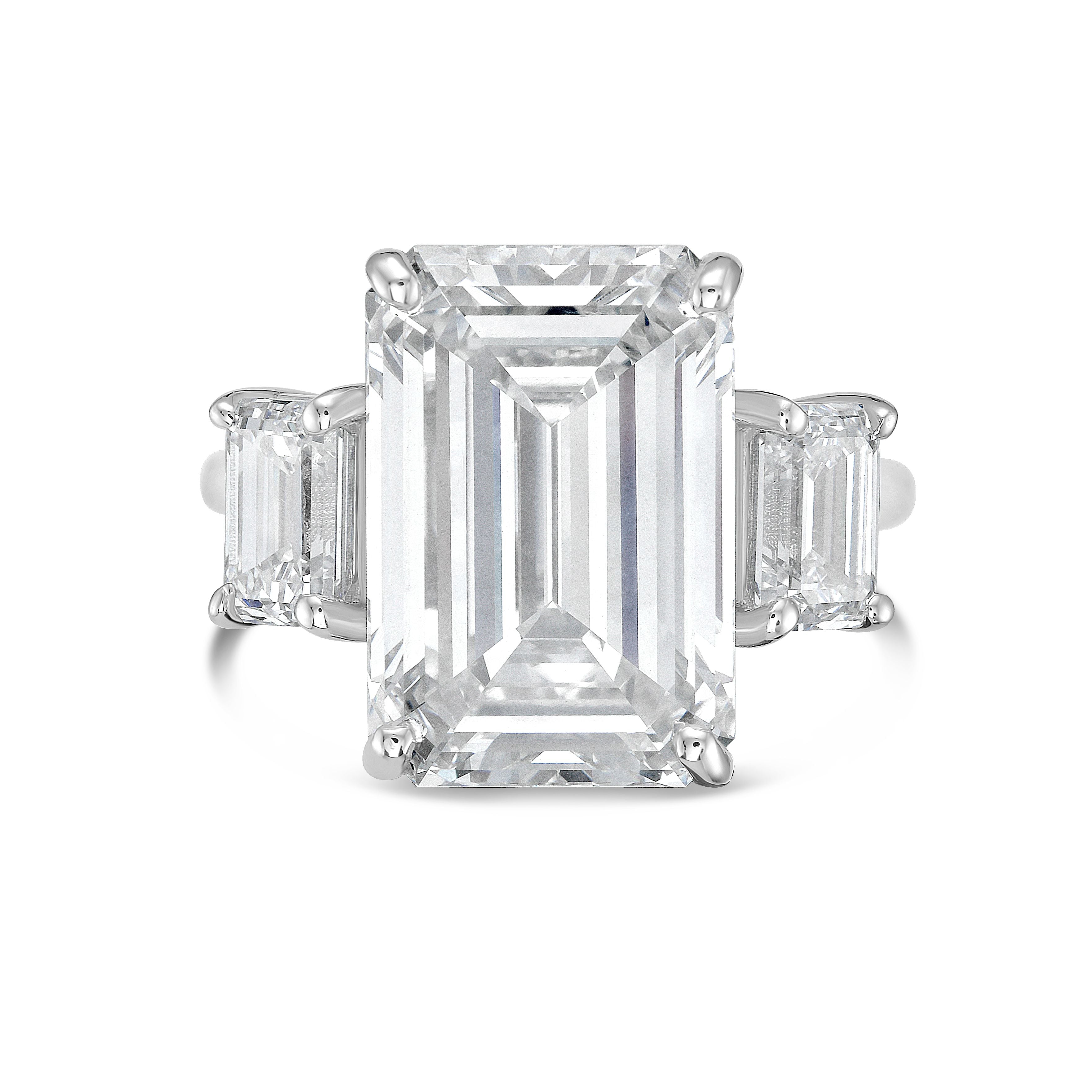 Three stone emerald cut lab diamond engagement ring in 18K white gold, DEF VS