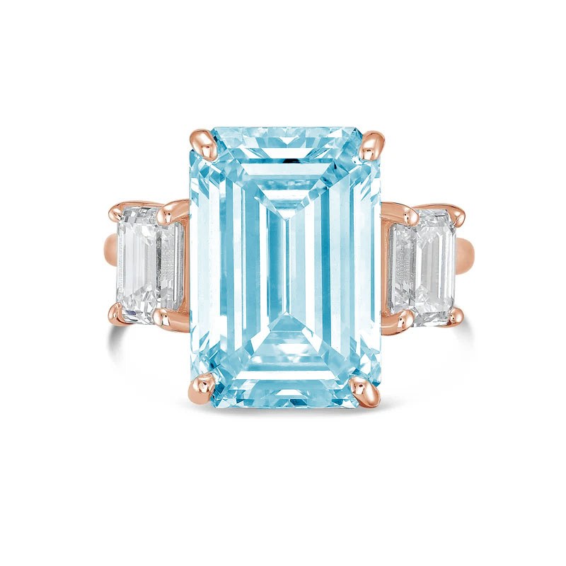 Lab-Grown Blue Emerald Cut Three Stone Ring in 14K Rose Gold