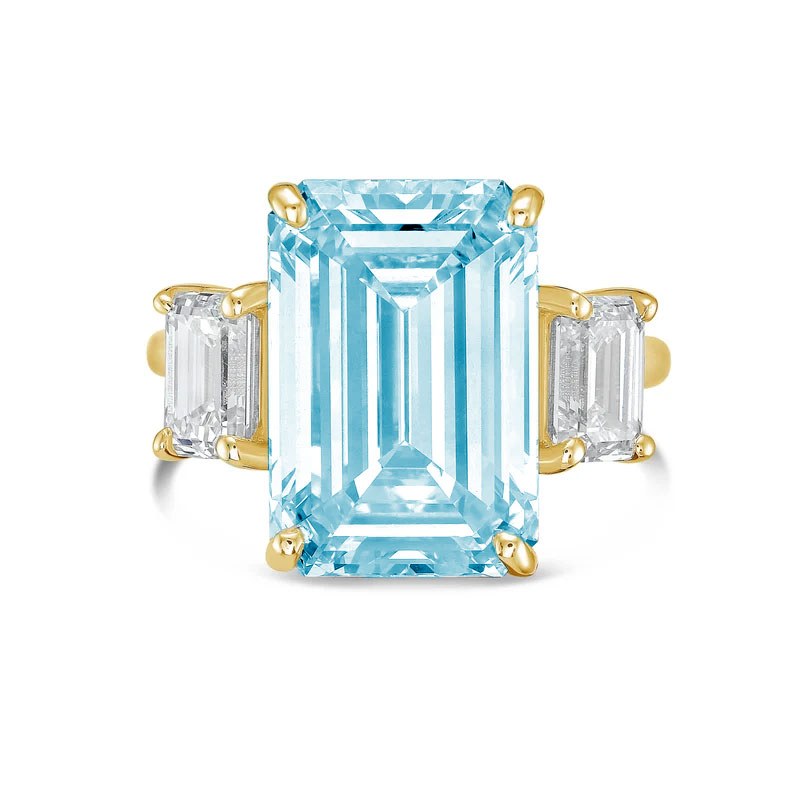 Lab-Grown Blue Emerald Cut Three Stone Ring in 14K Yellow Gold