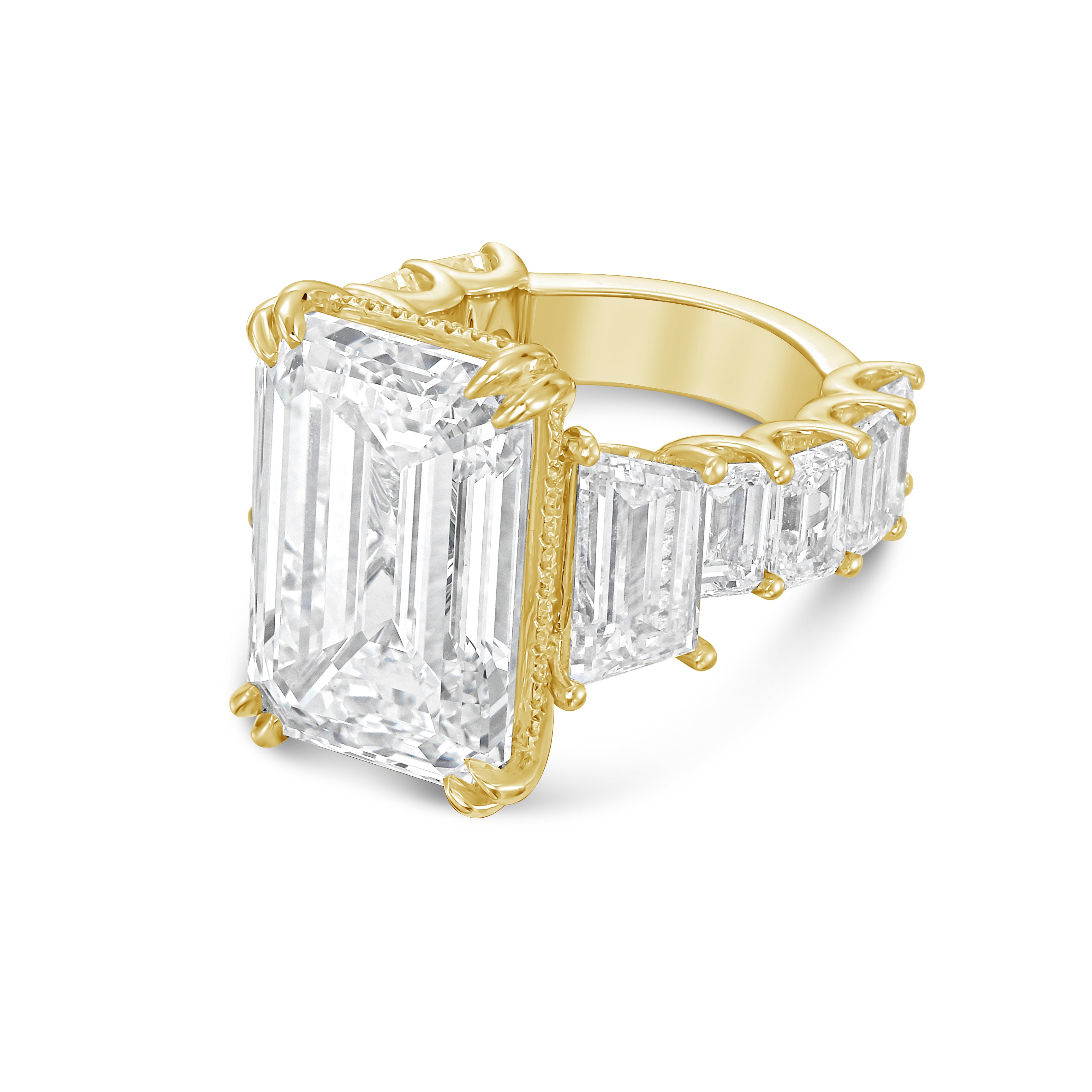 Side profile of 18k yellow gold emerald cut diamond ring with hidden halo