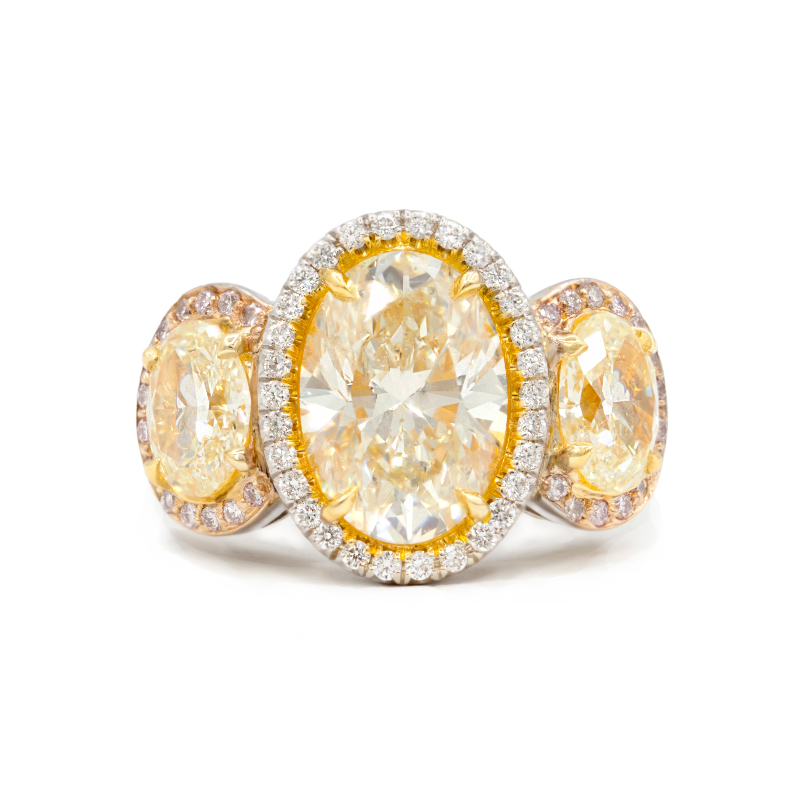 4.52ct Three-Stone Fancy Yellow Oval Diamond Ring