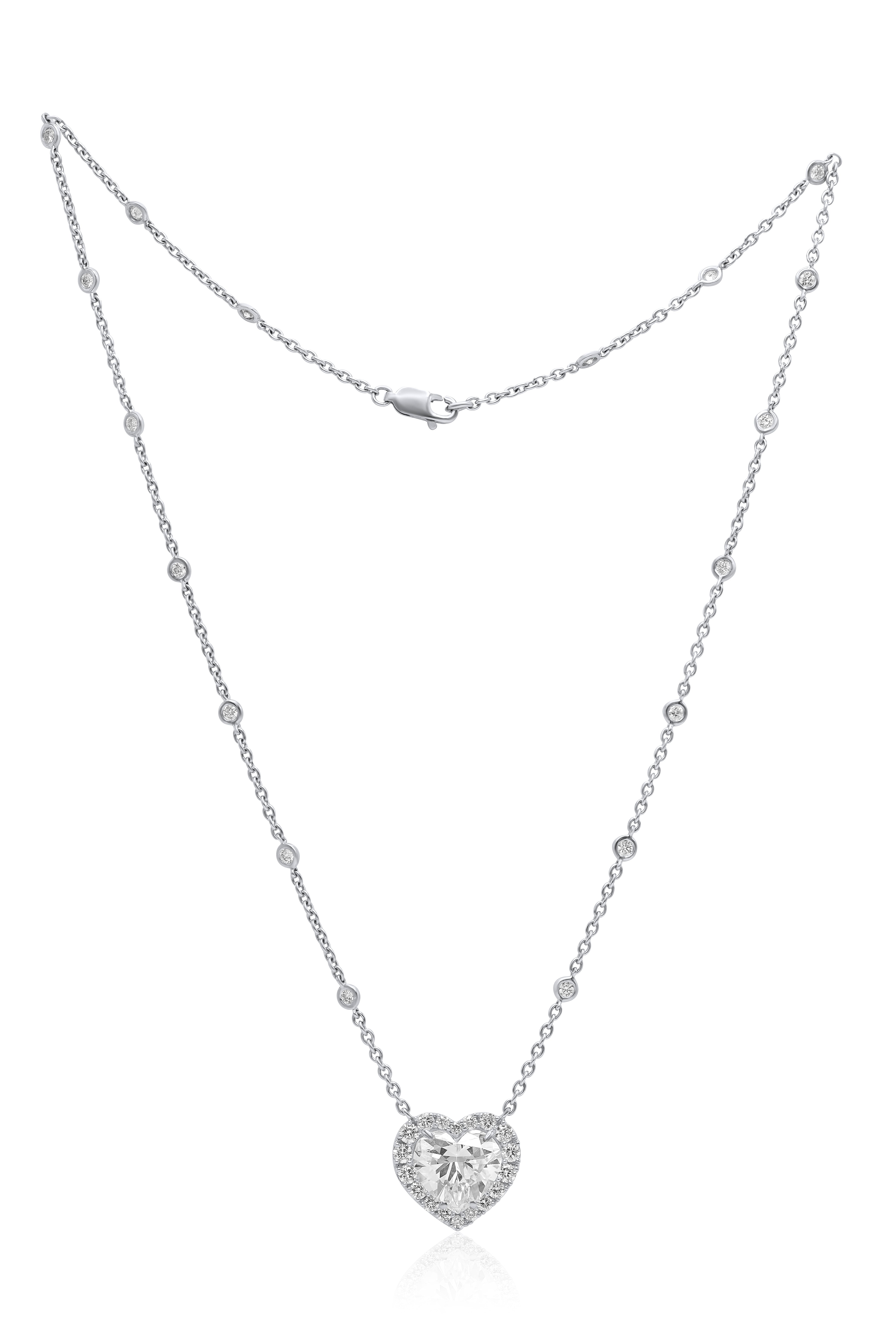 White gold heart diamond necklace with micropavé halo and round chain diamonds